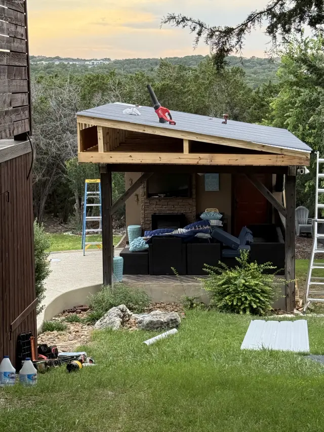 Backyard pavilion with a new framed shed roof