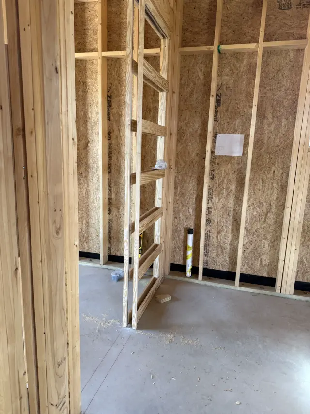 Second pocket door rough opening framed in a hallway